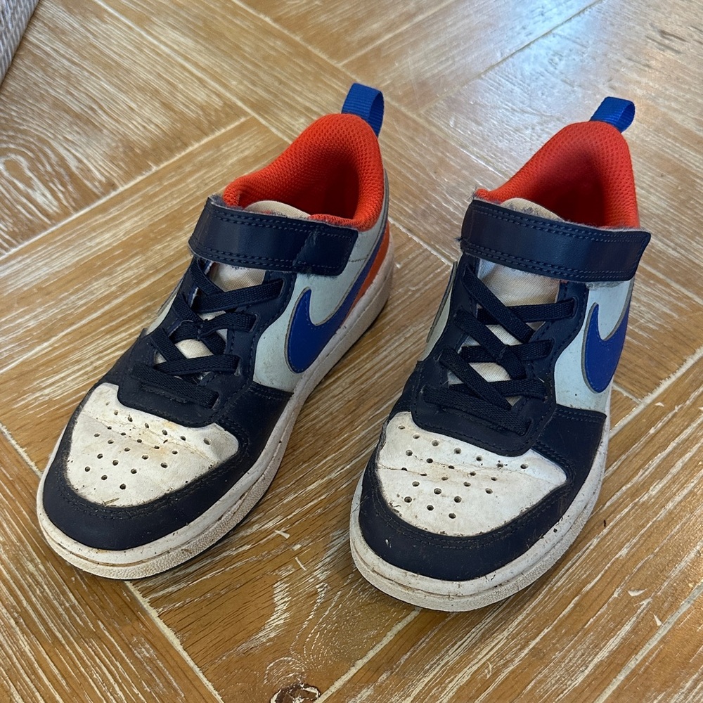 Nike Kids Black and Blue Sneakers with Red Accents